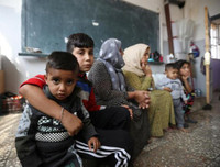 [ẢNH]: Đau lòng cuộc sống bấp bênh của các em nhỏ trong cuộc chiến ở đông bắc Syria