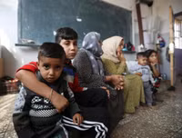 [ẢNH]: Đau lòng cuộc sống bấp bênh của các em nhỏ trong cuộc chiến ở đông bắc Syria