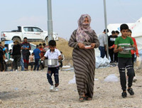 [ẢNH]: Đau lòng cuộc sống bấp bênh của các em nhỏ trong cuộc chiến ở đông bắc Syria