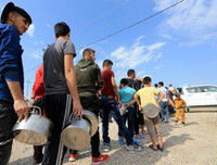 [ẢNH]: Đau lòng cuộc sống bấp bênh của các em nhỏ trong cuộc chiến ở đông bắc Syria