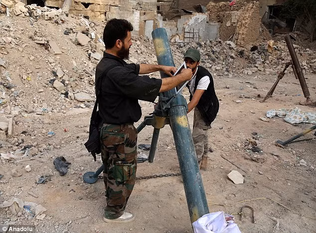 Quân nổi dậy Syria dùng Ipad để bắn súng cối, tên lửa ảnh 1