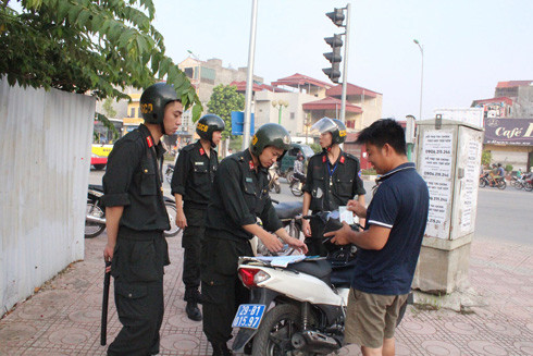 Xử phạt 8.500 vi phạm liên quan đến mũ bảo hiểm trong 1 tháng ảnh 1