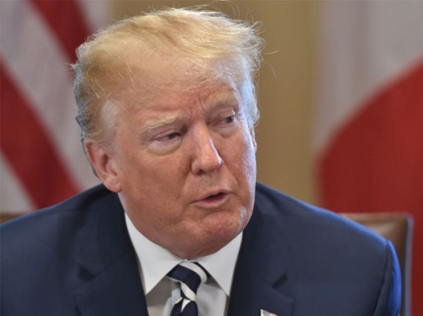 Ông Trump bất ngờ ca ngợi nhà lãnh đạo Triều Tiên "cởi mở" và "đáng kính" ảnh 1