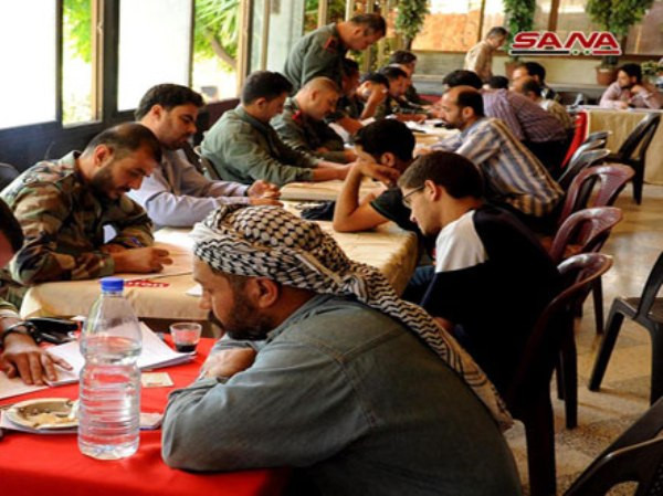 Hàng loạt phiến quân ở nam Damascus đầu hàng chính phủ, trở về cuộc sống đời thường ảnh 1