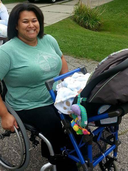 Xe nôi đẩy dành cho người khuyết tật ảnh 1