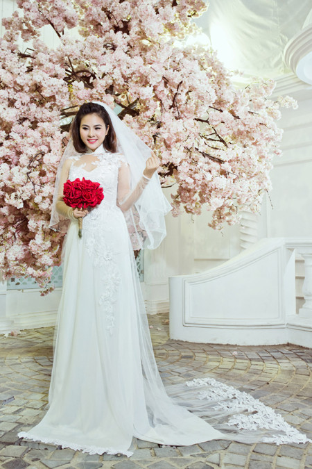 Vân Trang "gợi ý" những mẫu áo dài lộng lẫy chuẩn bị cho mùa cưới ảnh 11