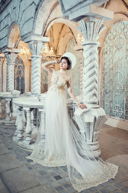 Vân Trang "gợi ý" những mẫu áo dài lộng lẫy chuẩn bị cho mùa cưới ảnh 7