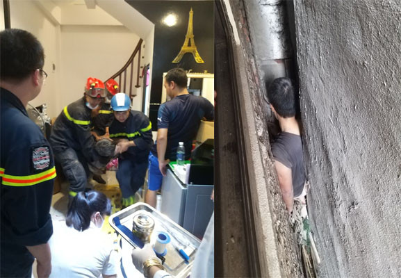 Giải cứu người đàn ông mắc kẹt trong khoảng không giữa 3 ngôi nhà ảnh 1 Giải cứu người đàn ông mắc kẹt trong khoảng không giữa 3 ngôi nhà ảnh 1