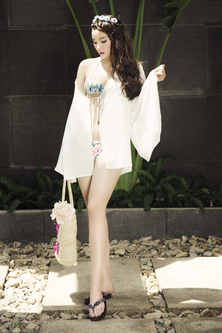Hoa hậu Kỳ Duyên diện bikini khoe vóc dáng hoàn hảo ảnh 4