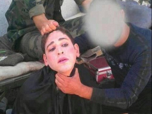 Cải trang thành phụ nữ hòng trốn thoát, chiến binh IS bị chặt đầu dã man ảnh 3