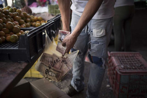 Venezuela chống "chiến tranh tiền tệ" ảnh 1
