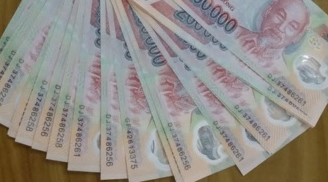 Khởi tố nhóm đối tượng buôn hơn 100 triệu tiền giả ảnh 2