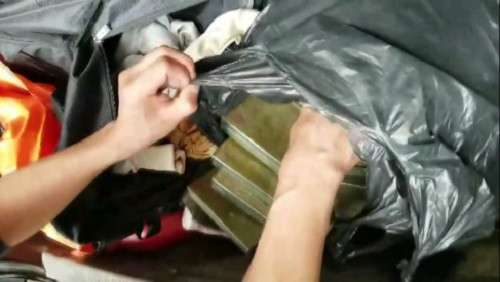 Bắt giữ đối tượng "cõng" 20 bánh heroin và 1.000 viên hồng phiến ảnh 1 Bắt giữ đối tượng "cõng" 20 bánh heroin và 1.000 viên hồng phiến ảnh 1