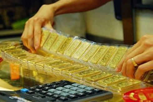 Giá vàng chờ đợi bật tăng trước diễn biến tiền tệ thế giới ảnh 1