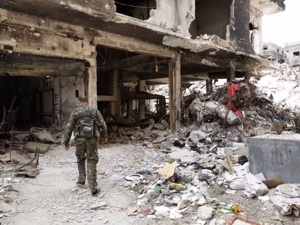 SAA phát hiện hố chôn tập thể các binh sĩ bị sát hại ở Đông Ghouta ảnh 1