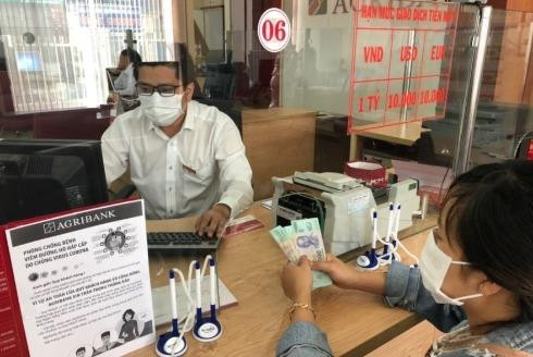 Lãi suất giảm, nhưng doanh nghiệp chưa dám mạnh tay vay vốn ảnh 1