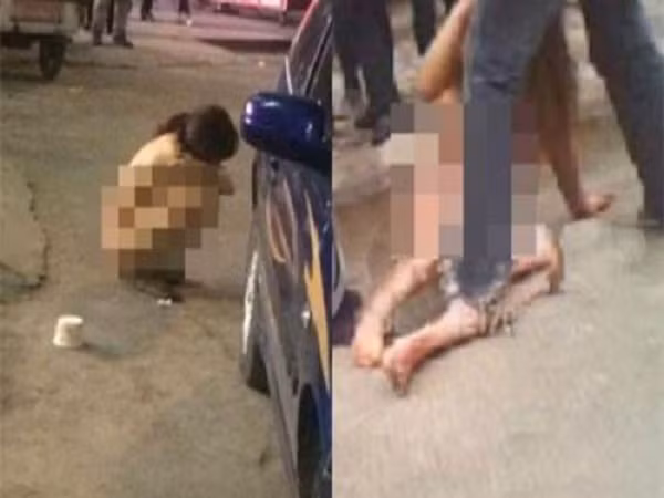 Vợ ngoại tình bị chồng lột trần giữa đường ảnh 1