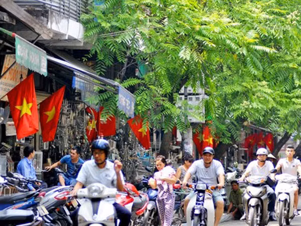 Hà Nội rực rỡ, bình yên trong ngày 30-4 lịch sử ảnh 9