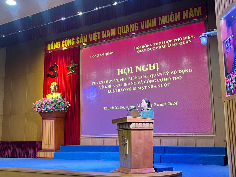 Thượng tá Đặng Thị Hồng Nhung, Phó trưởng phòng 2, Cục An ninh Chính trị nội bộ, Bộ Công an báo cáo viên của hội nghị