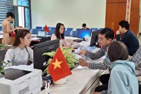 Những hình ảnh cán bộ, công chức Hà Nội duy trì nhịp hành chính thông suốt ngay sau Tết