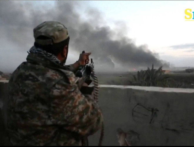 Binh sĩ SDF tấn công thị trấn Baghouz - căn cứ cuối cùng IS thuộc miền đông Syria Binh sĩ SDF tấn công thị trấn Baghouz - căn cứ cuối cùng IS thuộc miền đông Syria