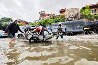 UBND TP Hà Nội trả lời cử tri về việc bao giờ hết cảnh ngập úng kéo dài mỗi khi mưa lớn?