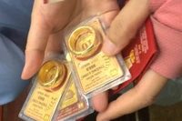 Nhận thưởng Tết bằng vàng, sổ tiết kiệm, ti vi, tủ lạnh có phải đóng thuế thu nhập cá nhân?