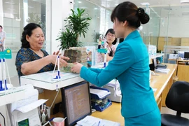 Sẵn sàng thực hiện mọi biện pháp ổn định thị trường tiền tệ