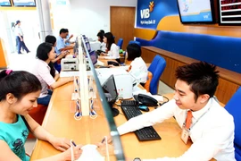 Ngân hàng chấp nhận giảm lãi để xử lý nợ xấu