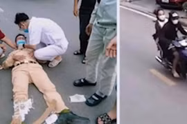 Đôi nam nữ không đội mũ bảo hiểm, lao thẳng xe vào Cảnh sát giao thông