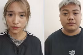 Bắt giữ đôi nam nữ vào cửa hàng điện thoại cướp giật túi xách