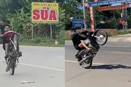 Hai gã trai 'bốc đầu' xe máy bị phạt gần 14 triệu đồng