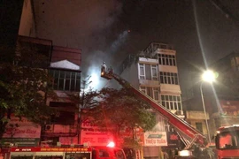 Tìm thấy 2 thi thể trong vụ cháy cửa hàng đồ sơ sinh ở phố Tôn Đức Thắng