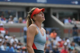 US Open 2014: Ngày buồn của Sharapova, Federer chiến thắng "nhờ" cơn mưa nặng hạt