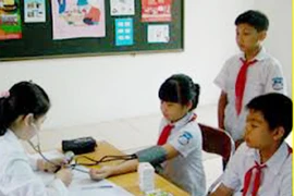 Bộ Y tế lý giải việc học sinh không được đóng BHYT theo hộ gia đình