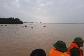 Tìm thấy thi thể hai anh em bị lũ cuốn