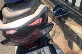 Người phụ nữ nghi bị lừa tiền để lại xe máy và thư xin lỗi chồng, con trên cầu