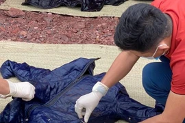 Điều tra vụ thi thể người bọc trong nhiều lớp áo