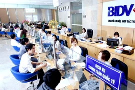 Chấp thuận việc sáp nhập MHB vào BIDV