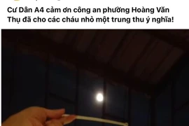 Các chiến sỹ Công an ‘hóa thân’ thành chú Cuội, chú Tễu tặng quà trung thu cho con trẻ sống trong ‘vùng Covid Đền Lừ’