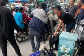 Bắt 'nóng' đối tượng cướp hiệu vàng ở phố Tôn Đức Thắng