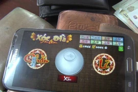 Bắt quả tang 14 đối tượng đánh bạc dưới hình thức xóc đĩa 