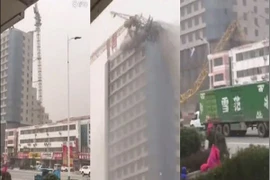 Video cần cẩu xây dựng đổ vào tòa nhà cao tầng