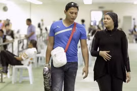 Bụng bầu 8 tháng vẫn đi thi Olympic