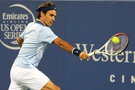 Dùng lại vợt cũ, Federer giành chiến thắng