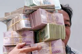 Tăng trưởng tín dụng 12% năm 2013: Vì nền kinh tế hay vì thành tích?