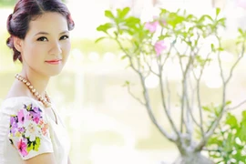 Trần Thị Quỳnh dự thi Hoa hậu Quý bà thế giới 2013