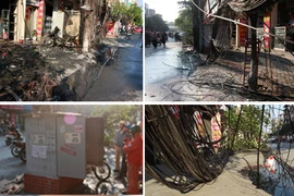 Cháy ụ điện sát nhà dân