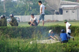 Phát hiện thi thể một phụ nữ trôi sông