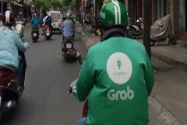Ba tài xế GrabBike bị nhóm người lạ đánh hội đồng